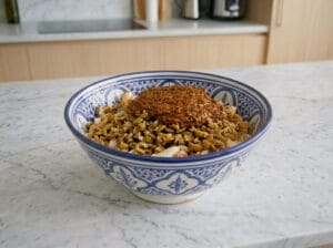 Adding Chermoula and olives to vermicelli