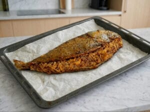 Filling the fish with the vermicelli mixture