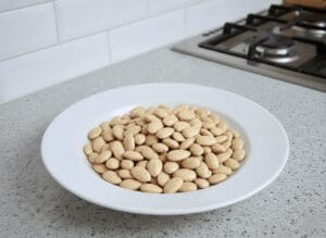 Peeling the almonds while they are hot