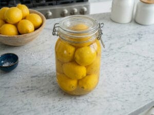 Place the lemon in a jar with salt water
