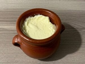 A traditional clay jar filled with Smen (aged butter)