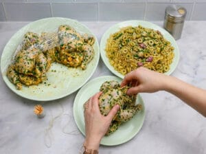 stuffing the chicken with the mixture of Chinese vermicelli and spices