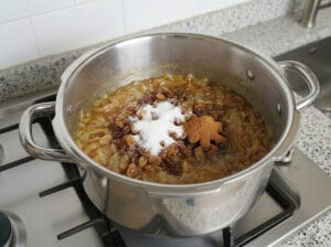 A pot of golden onions slow-cooked with cinnamon and sugar