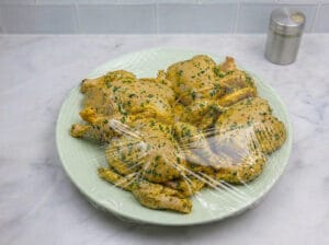 wrapping the chicken stuffed with Chinese vermicelli