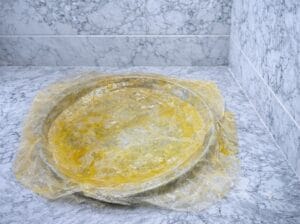 Moroccan fish pastilla (bastilla) in a baking dish, featuring layers of crispy warqa pastry