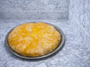 A baking tray with Moroccan fish bastilla.