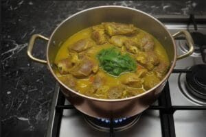 A pot of meat tenderly cooked in rich couscous broth