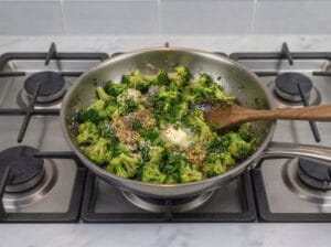 Broccoli in a frying pan with butter and spices