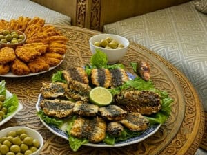 A plate of Moroccan fried sardines with chermoula