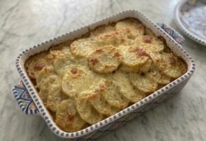Fully cooked, golden-brown, and crispy Savoyard gratin.